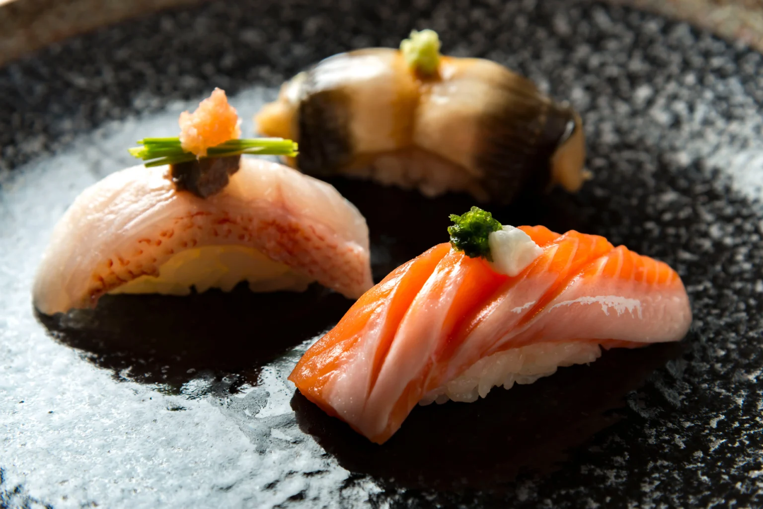 Group of travelers enjoying authentic Japanese meal